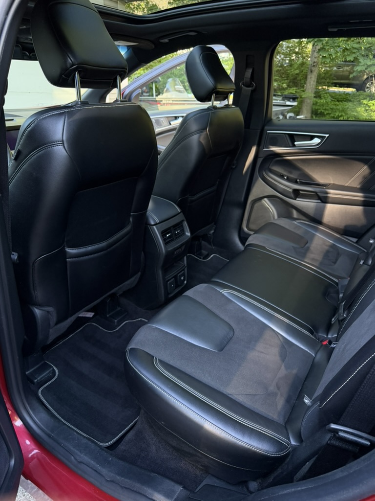 Black leather rear seats interior detail