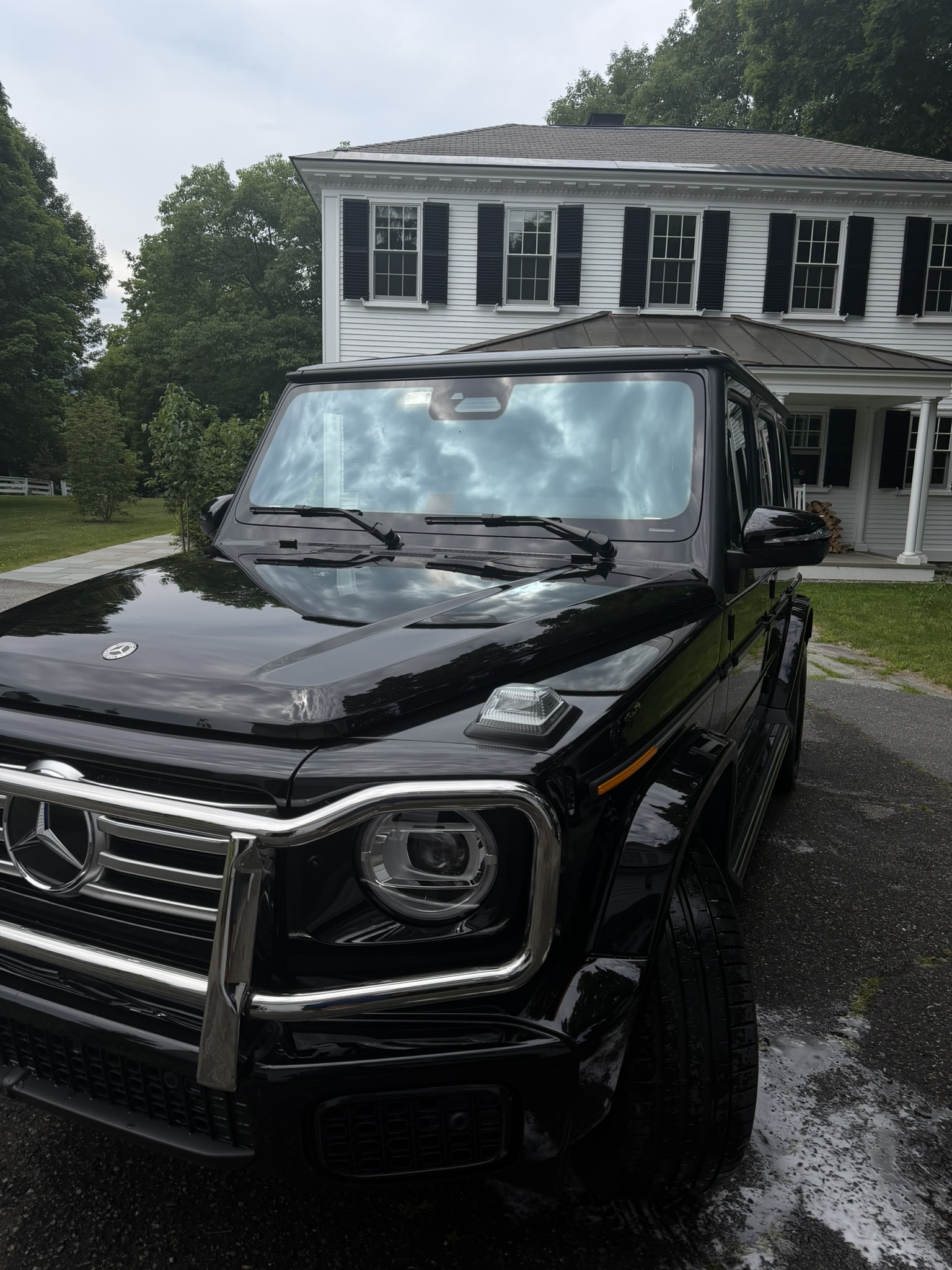 Black Mercedes G-Wagon exterior detail, wide angle