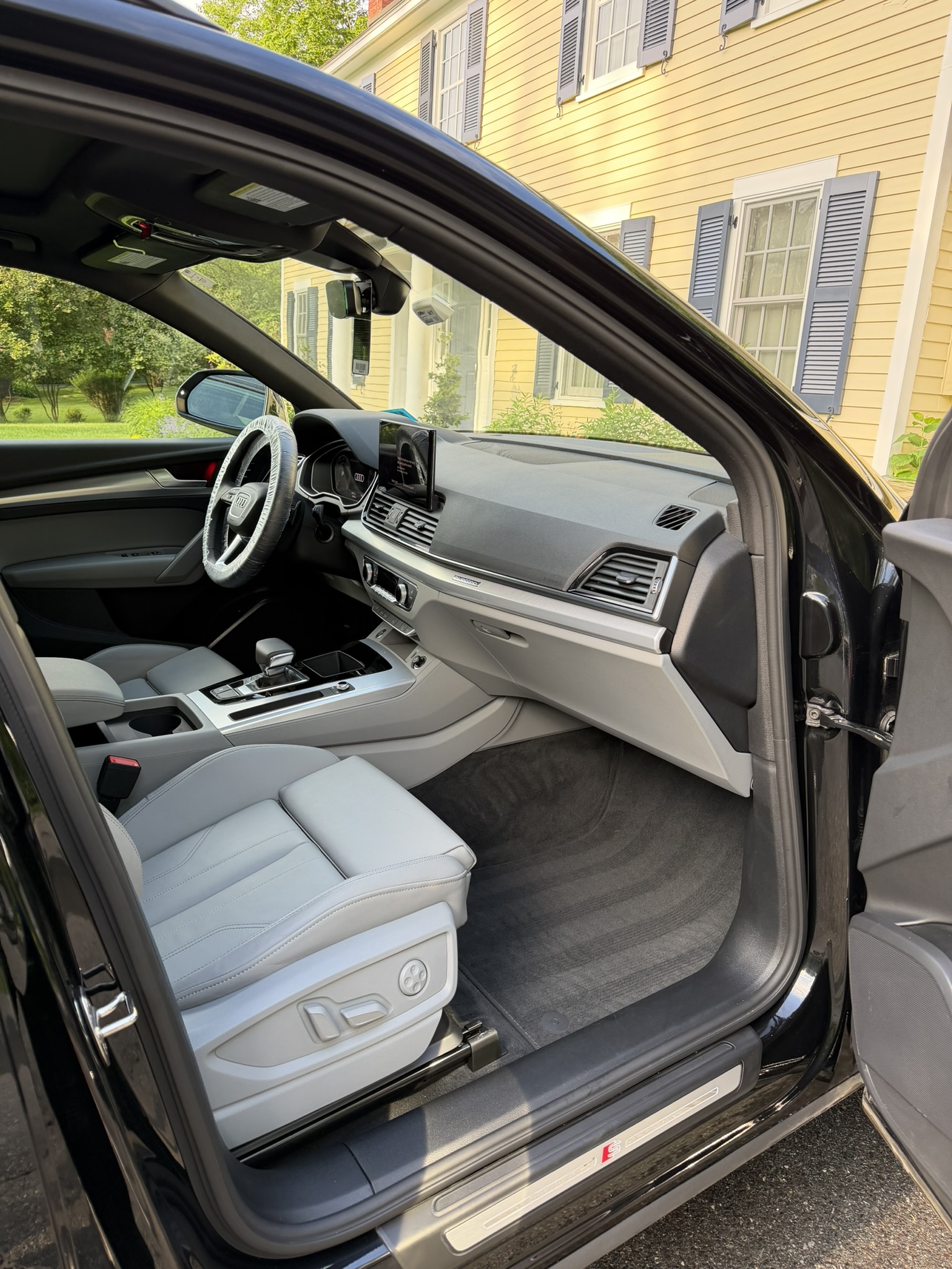 Black Audi Q5 interior detail, wide angle